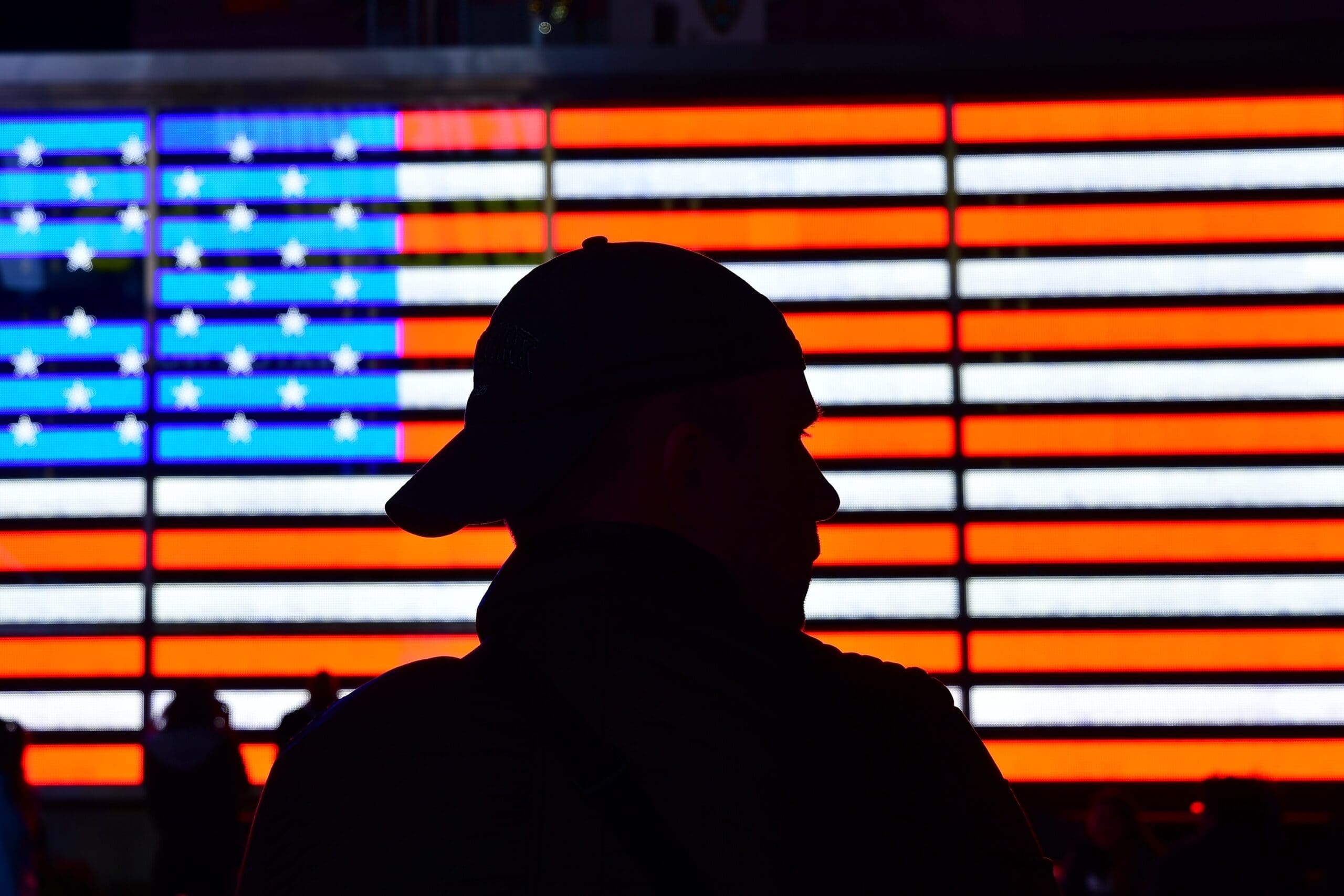 Silhouette of a person and American flag