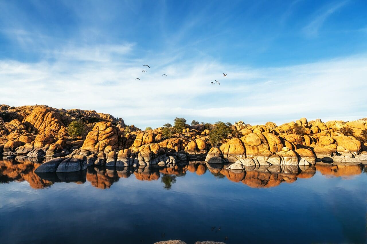 Red Rock Reflection On Arizona Lake